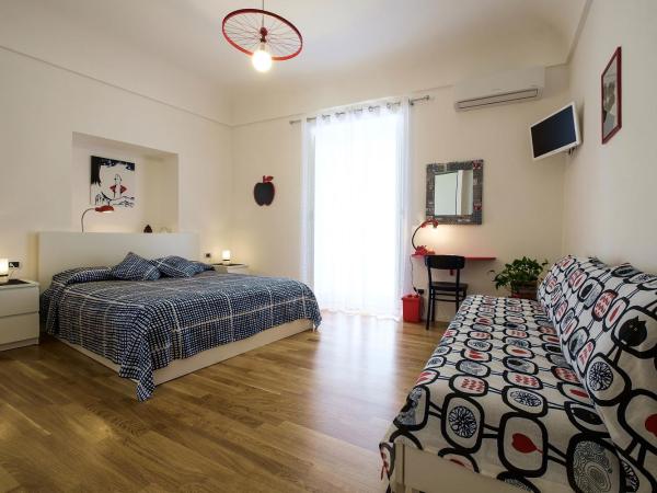 MAD Bed & Breakfast : photo 1 de la chambre chambre double avec lit d'appoint