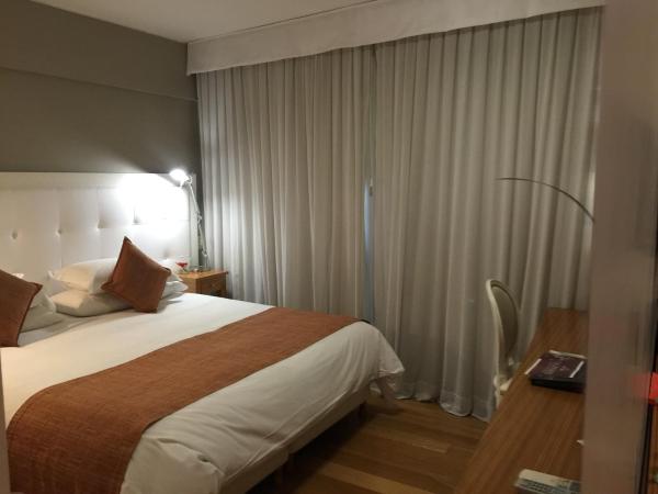 Purobaires Hotel Boutique : photo 1 de la chambre chambre double de luxe avec baignoire spa