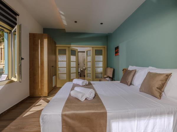 Cathedral Suites : photo 1 de la chambre suite lit king-size avec balcon