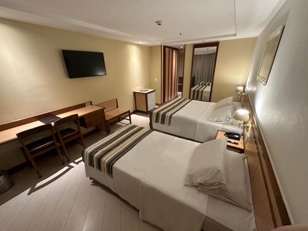 Riale Vilamar Copacabana : photo 2 de la chambre chambre triple de luxe