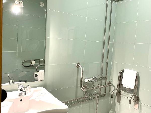 Hotel Universal : photo 2 de la chambre chambre lits jumeaux pour personnes à mobilité réduite