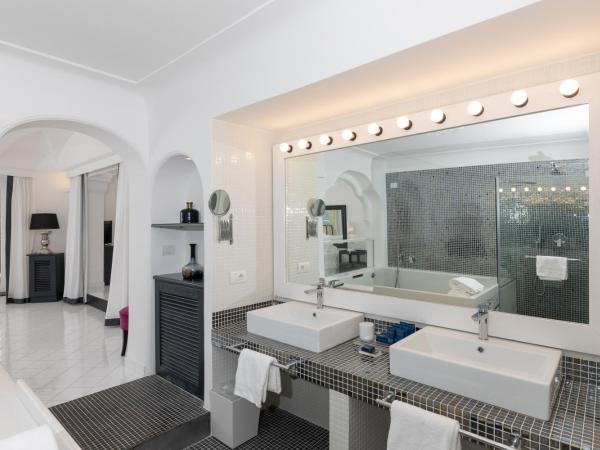 Hotel Mamela : photo 7 de la chambre suite avec baignoire spa