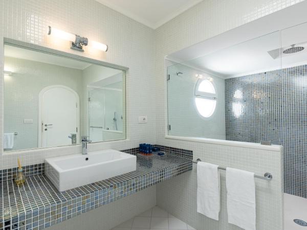Hotel Mamela : photo 9 de la chambre suite avec baignoire spa