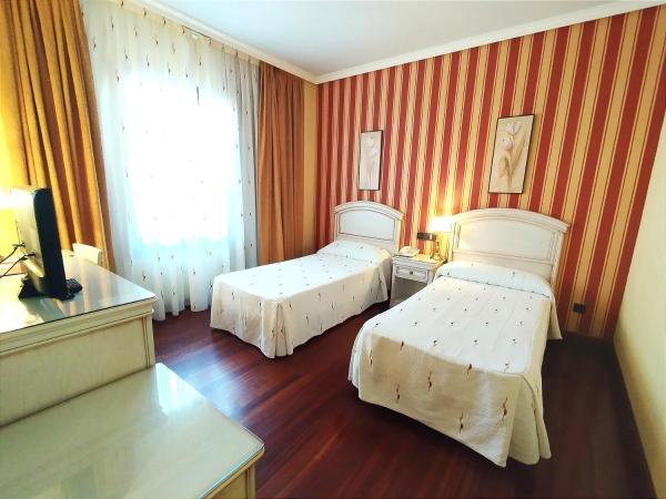 Hotel Conde Ansúrez By Almia Hoteles : photo 1 de la chambre chambre lits jumeaux