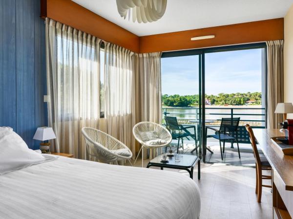 Hotel Le Pavillon Bleu : photo 4 de la chambre suite junior - vue sur lac