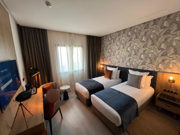 Hotel Ben Batouta - Tanger : photo 1 de la chambre chambre lits jumeaux supérieure