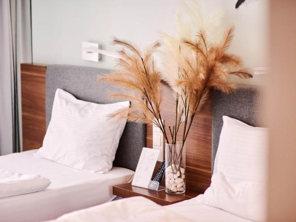 Focus Hotel Premium Lublin Conference & SPA : photo 1 de la chambre chambre lits jumeaux