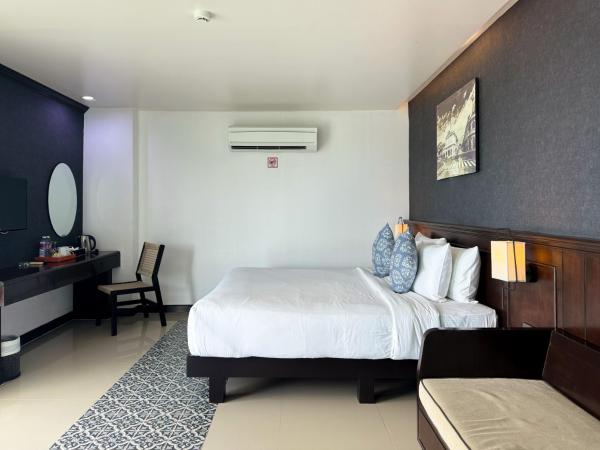 Grand Supicha City Hotel - SHA Plus : photo 3 de la chambre chambre double deluxe avec baignoire