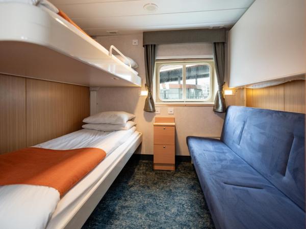 Quest : photo 2 de la chambre chambre triple - vue sur mer