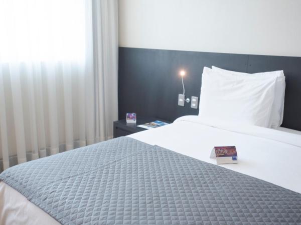 Tryp by Wyndham Belo Horizonte Savassi : photo 1 de la chambre suite lit queen-size premium - non-fumeurs