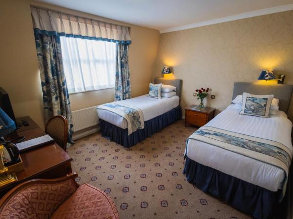 London Lodge Hotel : photo 3 de la chambre chambre lits jumeaux standard