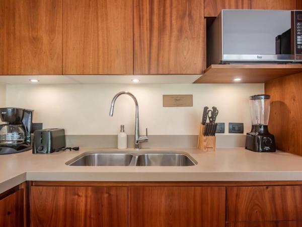 Copal Tulum Hotel : photo 4 de la chambre appartement de luxe jungle 2 chambres avec 1 lit king-size, 2 lits simples, 1 canapé-lit king-size et terrasse - vue sur jardin