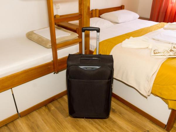 Jardim Botânico House : photo 10 de la chambre chambre quadruple