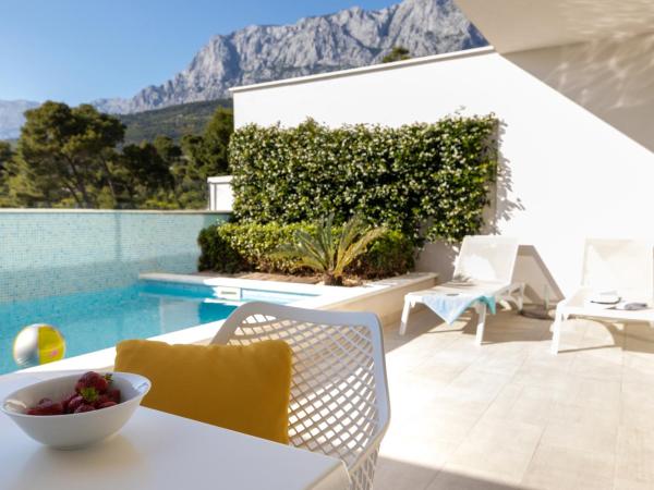 Romana Beach Resort : photo 2 de la chambre suite junior avec piscine privée - vue sur montagne
