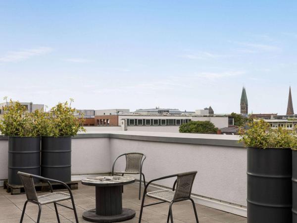 Vienna House Easy by Wyndham Bremen City Apartments : photo 3 de la chambre suite junior