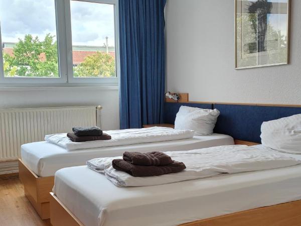 HW Hotel - Haus am Niederfeld : photo 1 de la chambre chambre lits jumeaux avec salle de bains privative