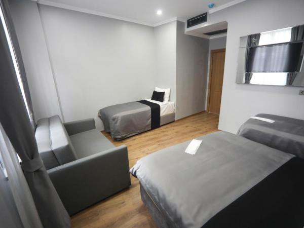 Yuvam akmarmara hotel : photo 10 de la chambre chambre triple basique