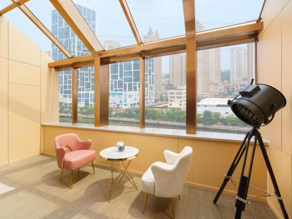 Atour S Hotel Xinghai Square : photo 3 de la chambre jimu double room with garden view