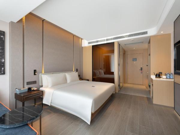 Atour S Hotel Xinghai Square : photo 1 de la chambre chambre double supérieure