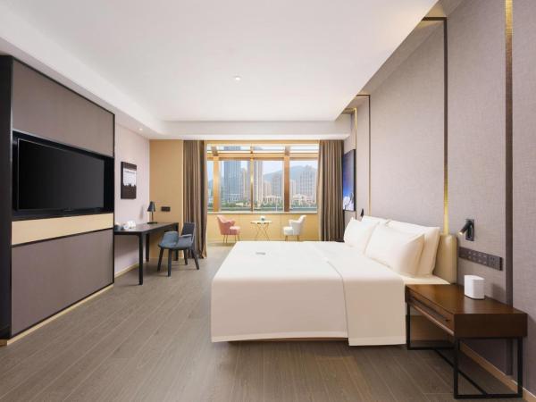 Atour S Hotel Xinghai Square : photo 4 de la chambre jimu double room with garden view