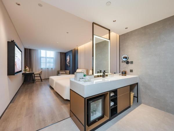 广州琶洲会展中心亚朵酒店-广交会期间免费穿梭巴士 : photo 4 de la chambre jimu twin room