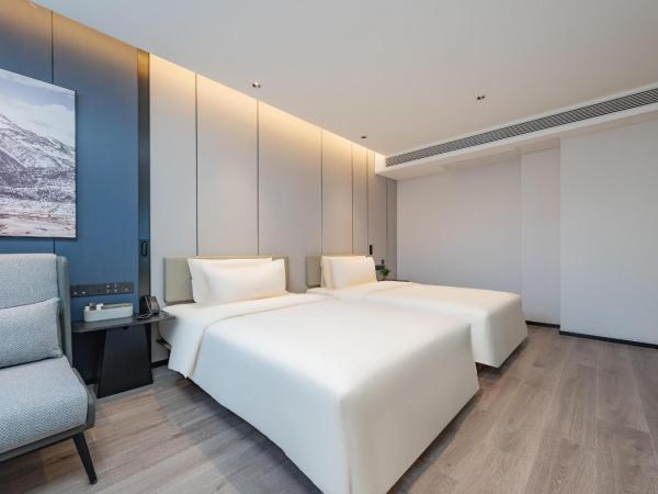 广州琶洲会展中心亚朵酒店-广交会期间免费穿梭巴士 : photo 3 de la chambre jimu twin room