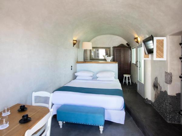 Ducato di Oia - Adults Only : photo 5 de la chambre suite deluxe avec petite piscine intérieure et vue sur caldeira