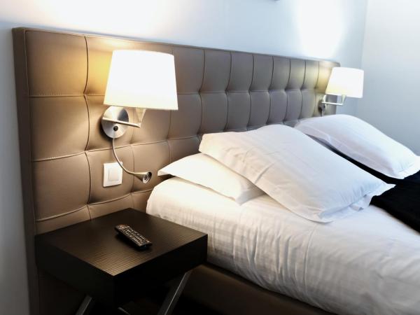 Le Saint Louis : photo 1 de la chambre chambre quadruple