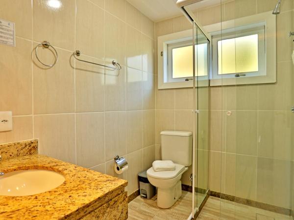 Pousada Santorini : photo 7 de la chambre chambre double avec baignoire spa