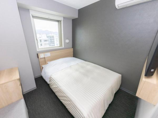 Super Hotel Sapporo Kitagojo Dori : photo 1 de la chambre chambre double standard
