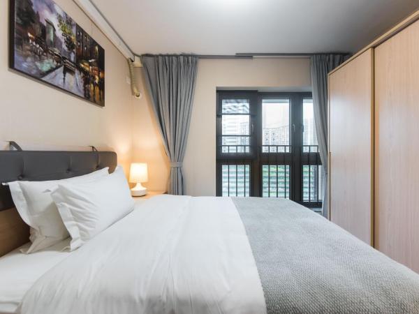 WESU Weisu Service Apartment - Shenzhen University Nanshan Science and Technolog Park : photo 7 de la chambre appartement