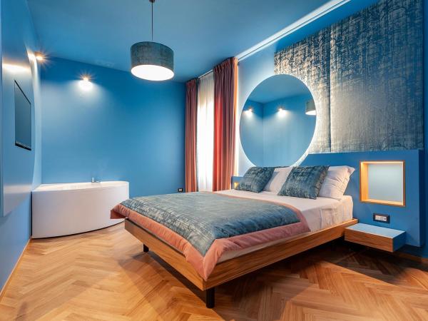 Le Texture Premium Rooms Duomo-Cordusio : photo 1 de la chambre chambre lit queen-size avec baignoire spa