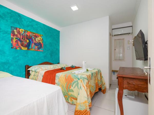 Pousada Flor de Ponta Negra : photo 1 de la chambre chambre triple classique