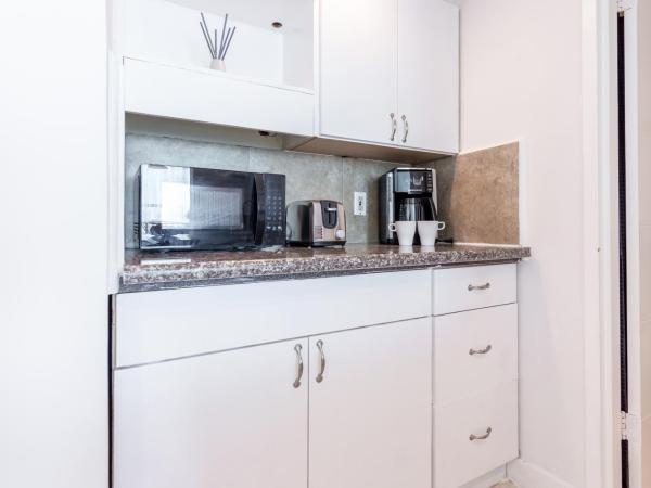 Girasole Apartments : photo 4 de la chambre suite lit queen-size deluxe