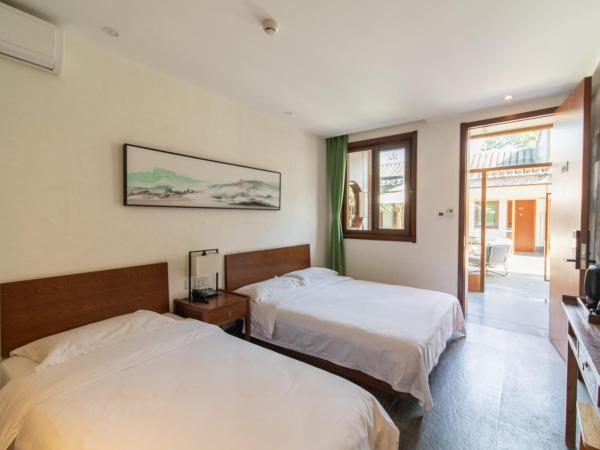 Guipu Beihai Courtyard Hotel : photo 3 de la chambre chambre familiale deluxe