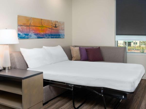Hyatt House Orlando Airport : photo 6 de la chambre one-bedroom suite with two queen beds with kitchen and sofa bed