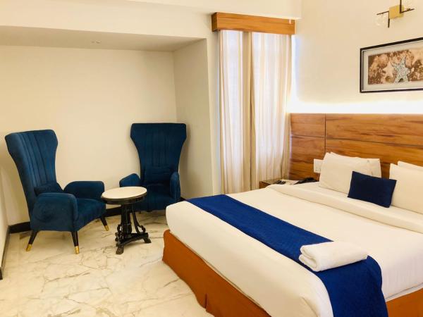 Hotel Aman Palace : photo 1 de la chambre chambre lit king-size supérieure