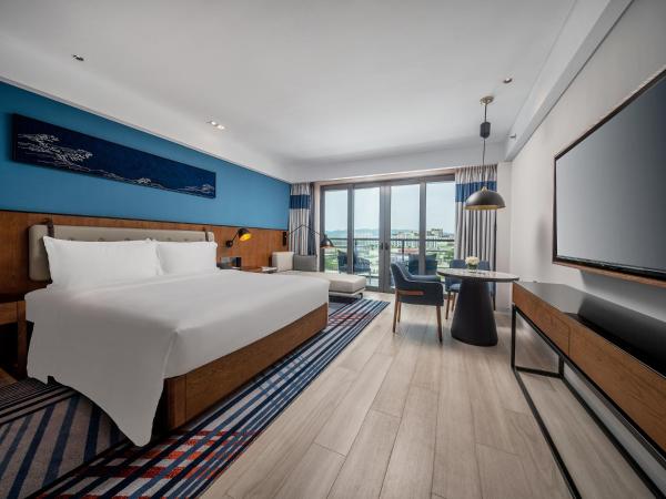 Sanya Haitang Bay Moutai Resort Superior Hotel : photo 1 de la chambre chambre lit queen-size - vue sur jardin