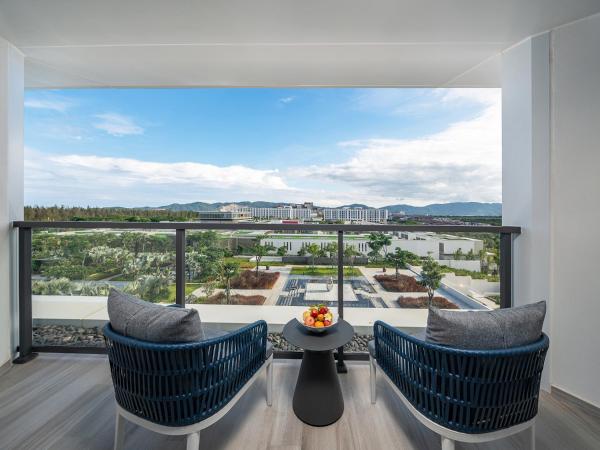 Sanya Haitang Bay Moutai Resort Superior Hotel : photo 4 de la chambre chambre lit queen-size - vue sur jardin