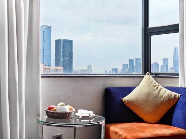 The Pavilion Century Tower (Huaqiang NorthBusiness Zone) : photo 2 de la chambre chambre supérieure lit queen-size