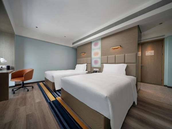Sanya Haitang Bay Moutai Resort Boutique Hotel : photo 3 de la chambre chambre lits jumeaux - vue sur jardin