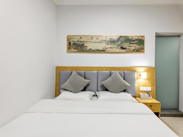 Happy Dragon Hotel - close to Forbidden City&Wangfujing Street&free coffee &English speaking,Newly renovated with tour service : photo 2 de la chambre small double room（no window）