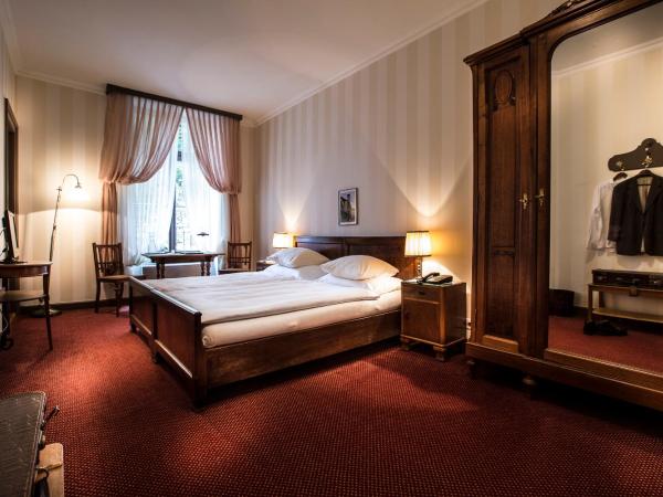 Grandhotel Giessbach : photo 1 de la chambre chambre double supérieure - vue sur forêt