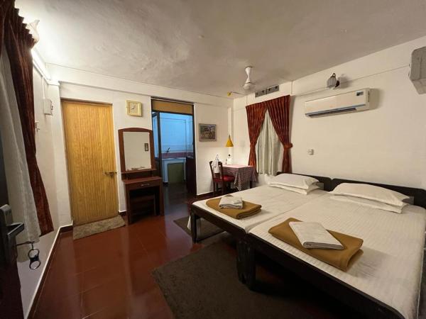 Eden Garden Farm Stay : photo 2 de la chambre chambre double - vue sur jardin