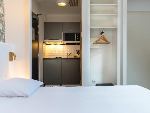CALM Appart' & Hostel : photo 1 de la chambre appartement lit double ou lits jumeaux supérieur