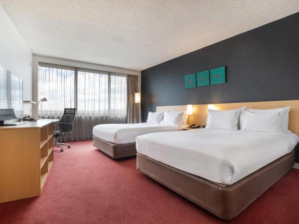 Holiday Inn Melbourne Airport, an IHG Hotel : photo 1 de la chambre hébergement standard avec 2 lits doubles