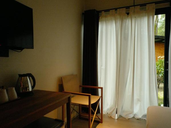 Nature Beach Resort : photo 7 de la chambre chambre double - vue sur jardin