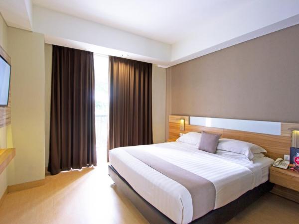 Hotel FortunaGrande Seturan Yogyakarta : photo 2 de la chambre chambre deluxe double ou lits jumeaux