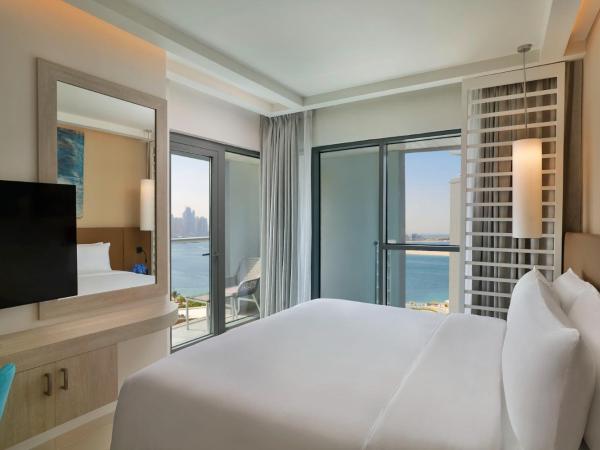 NH Collection Dubai The Palm : photo 1 de la chambre appartement club 1 chambre premium - vue sur mer