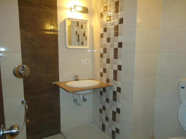 Hotel Maan Residency Satellite Road : photo 2 de la chambre chambre triple exécutive